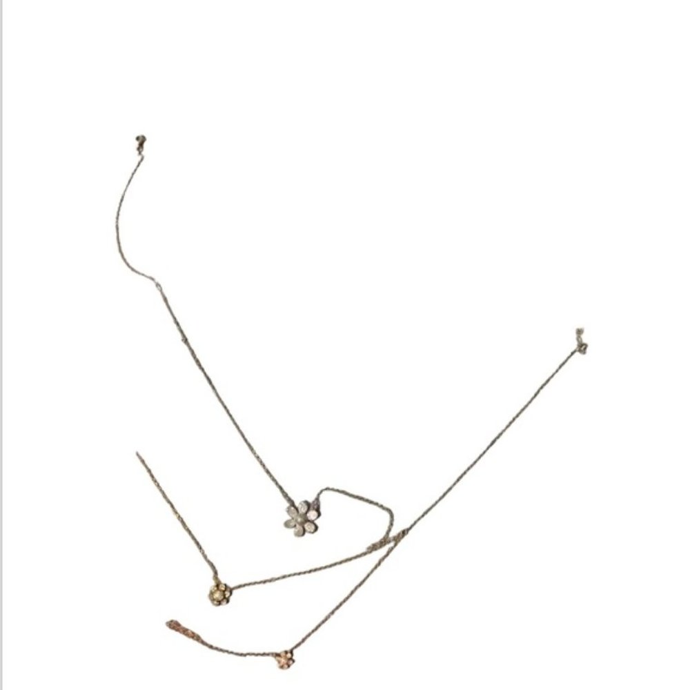 Gold rose gold and silver layered flower necklace